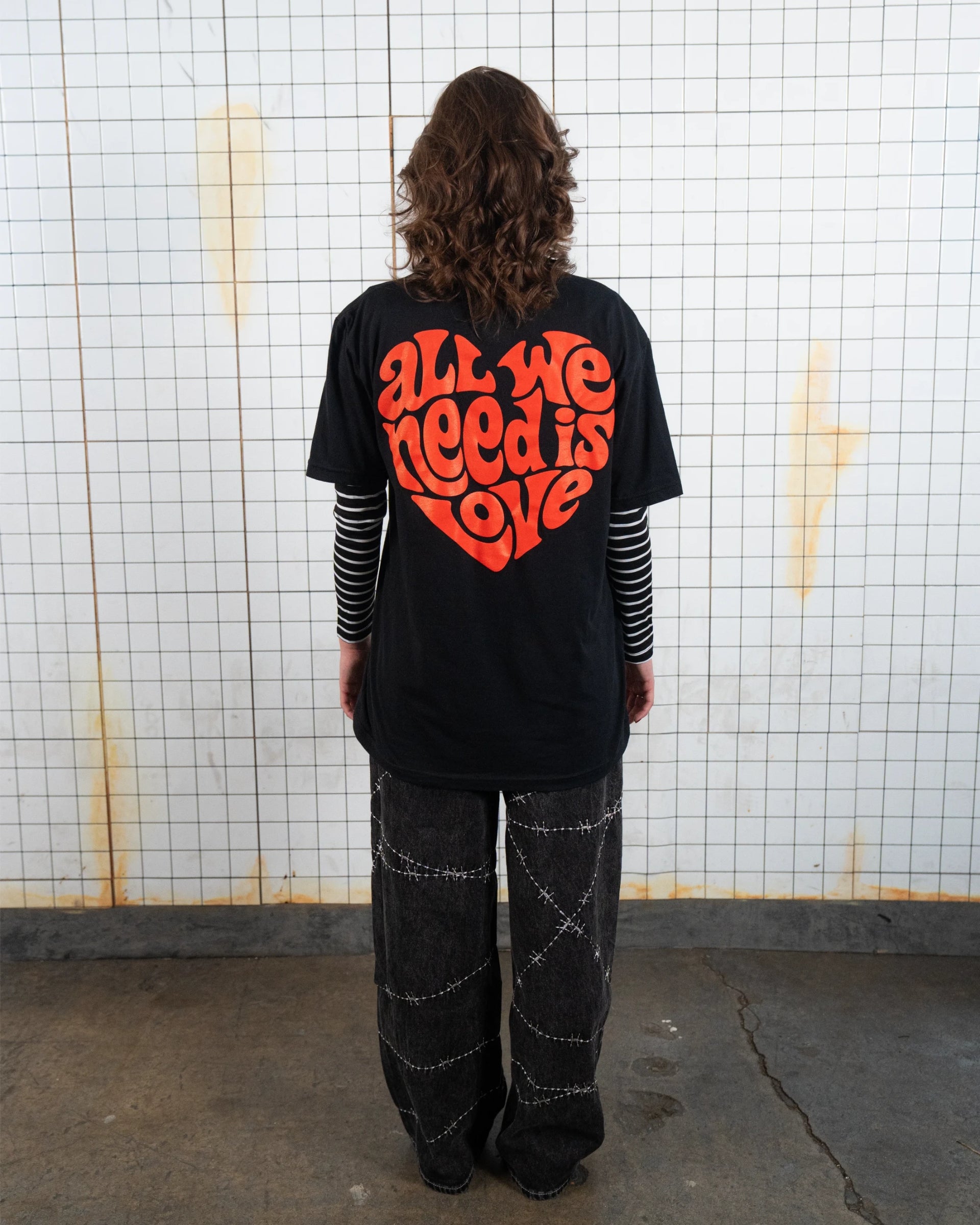 All We Need Tee